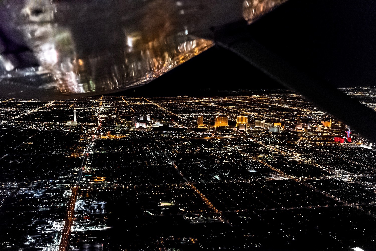 Plane Wing City Lights at Night